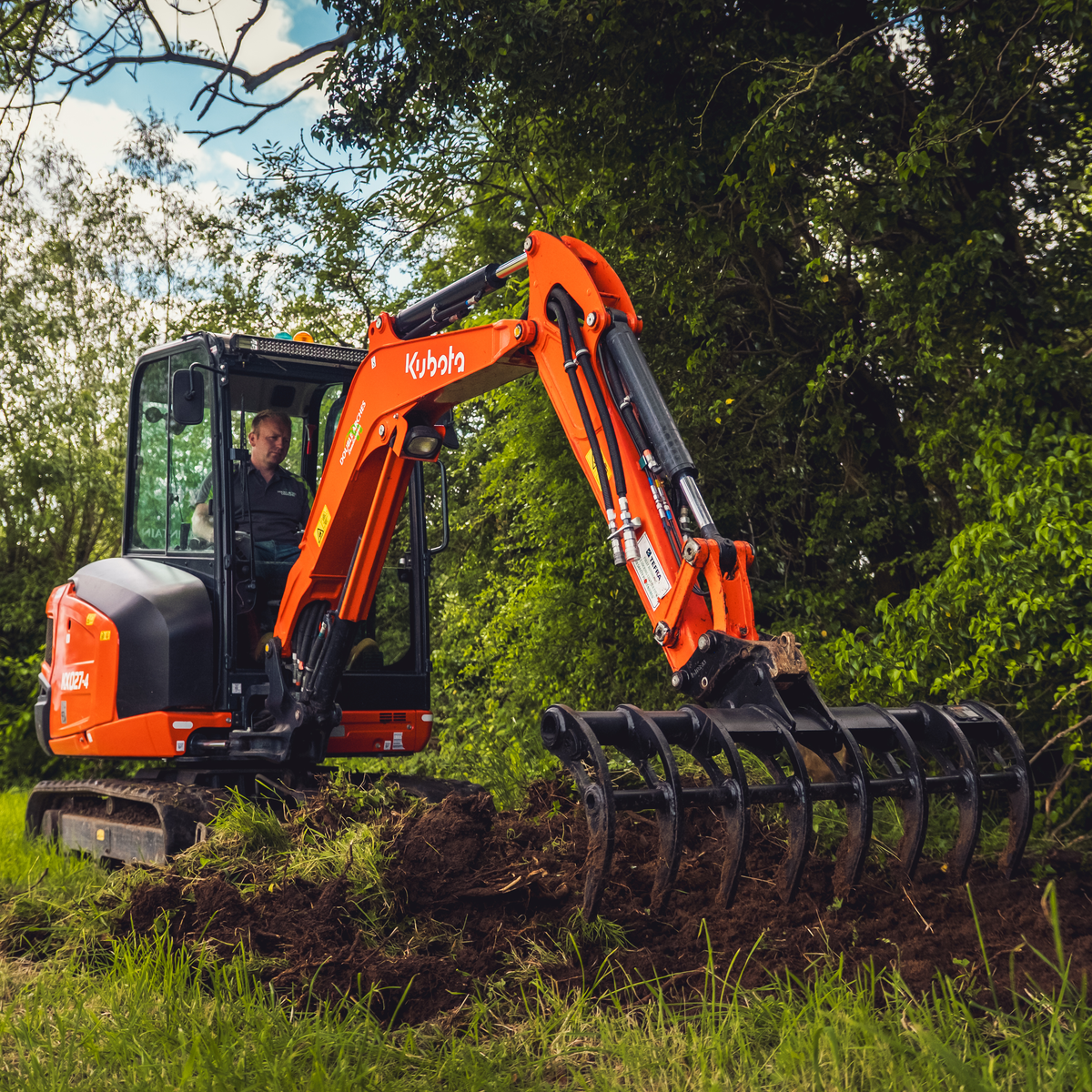Hardlife Root Rake mounted on excavator 